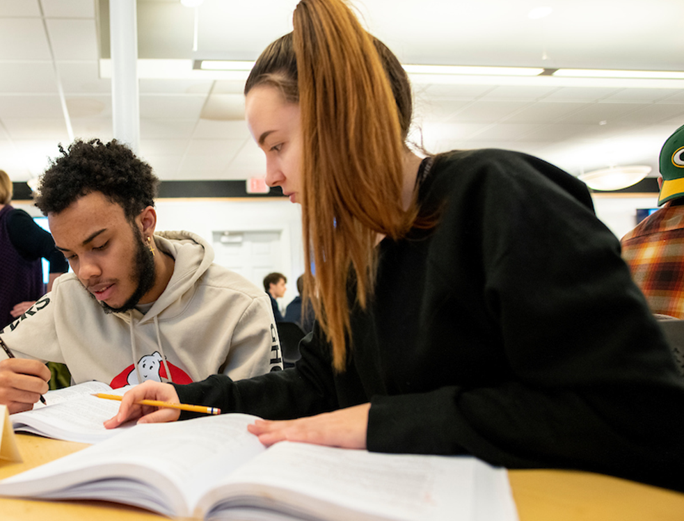 A photo of students working on a math problem